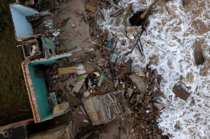 The Atlantic Ocean advances an average of six meters (nearly 20 feet) a year in the small town of Atafona north of Rio de Janeiro, which has long been prone to extreme erosion -- now exacerbated by climate change