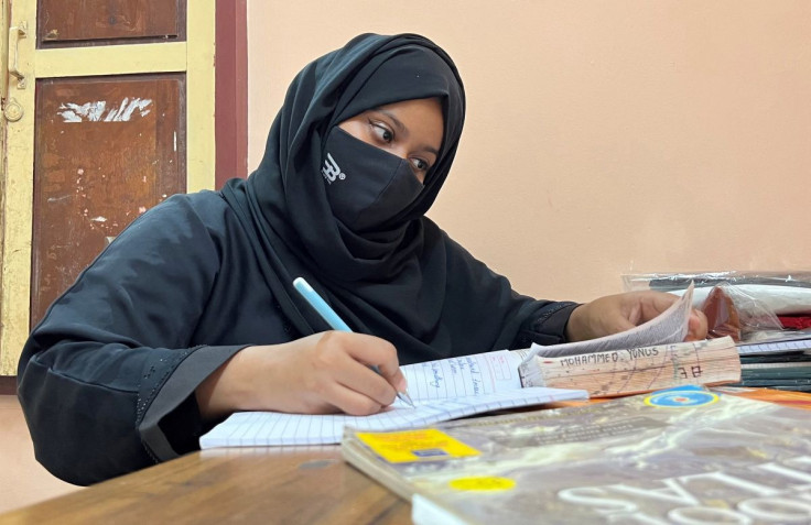 Ayesha Imthiaz, 21, a Muslim college student, wearing a hijab, studies in a room in Udupi, Karnataka state, India, February 11, 2022.
