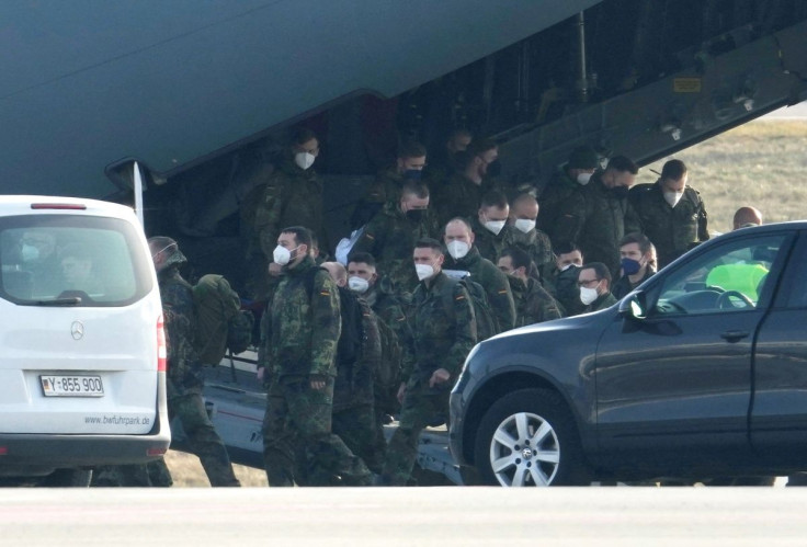 German troops for NATO enhanced Forward Presence battle group reinforcement arrive in Kaunas airport, Lithuania February 14, 2022.