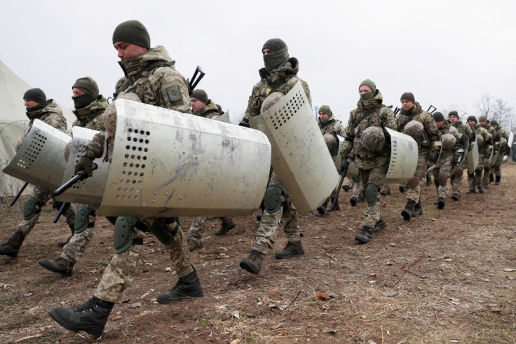 Members of the Ukrainian State Border Guard Service attend a training session near the border with Belarus and Poland in Volyn region, Ukraine November 16, 2021.