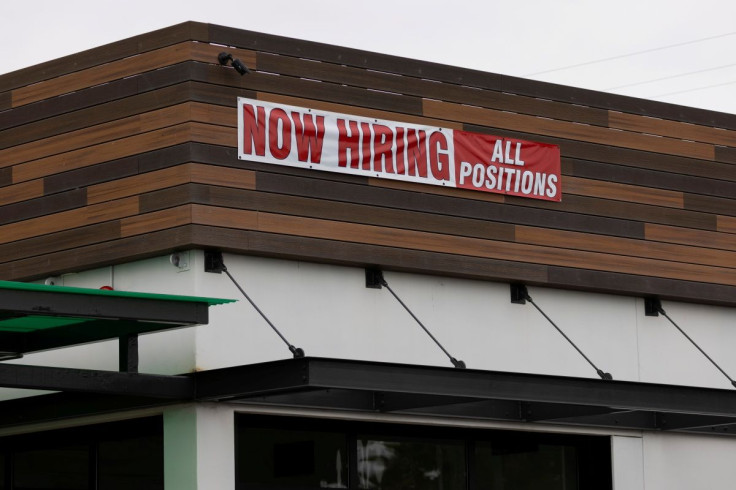 A restaurant advertising jobs looks to attract workers in Oceanside, California, U.S., May 10, 2021. 