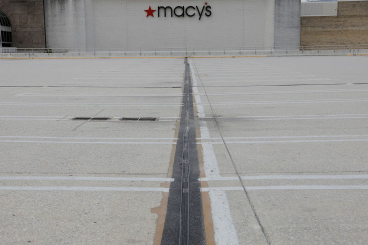 A Macy's department store stands behind an empty parking lot at King of Prussia Mall that remains closed due to the ongoing outbreak of the coronavirus disease (COVID-19) in Upper Merion Township, Pennsylvania U.S., May 21, 2020. 