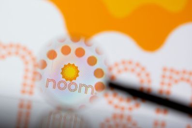 FILE PHOTO - Noom logo is seen through magnifier in this illustration taken, July 13, 2021. 