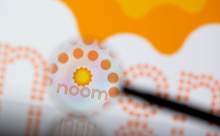FILE PHOTO - Noom logo is seen through magnifier in this illustration taken, July 13, 2021. 