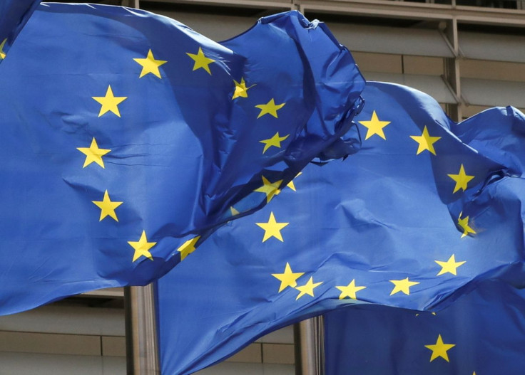 European Union flags flutter outside the EU Commission headquarters in Brussels, Belgium May 5, 2021. 