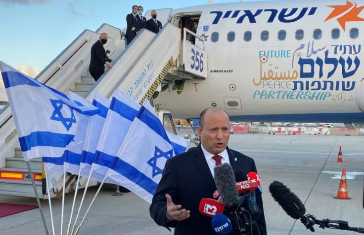 Israeli Prime Minister Naftali Bennett delivers a speech upon his departure to Bahrain on February 14, 2022 at Ben Gurion Airport near Tel Aviv