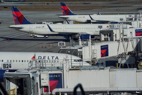 Delta Air Lines jets are seen at gates at Hartsfield-Jackson Atlanta International Airport in Atlanta, Georgia, U.S. December 22, 2021. 
