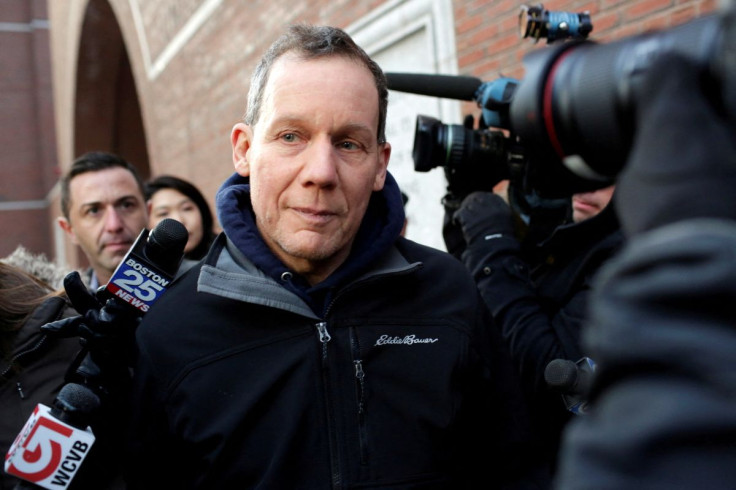 Charles Lieber leaves federal court after he and two Chinese nationals were charged with lying about their alleged links to the Chinese government, in Boston, Massachusetts, U.S. January 30, 2020.  
