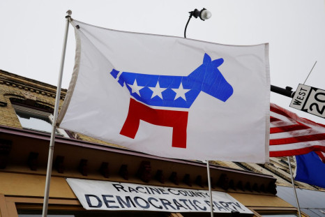 A flag with a logo of the Democratic Party flies over the office of the Racine County Democratic Party in Racine, Wisconsin, U.S., April 27, 2019.  