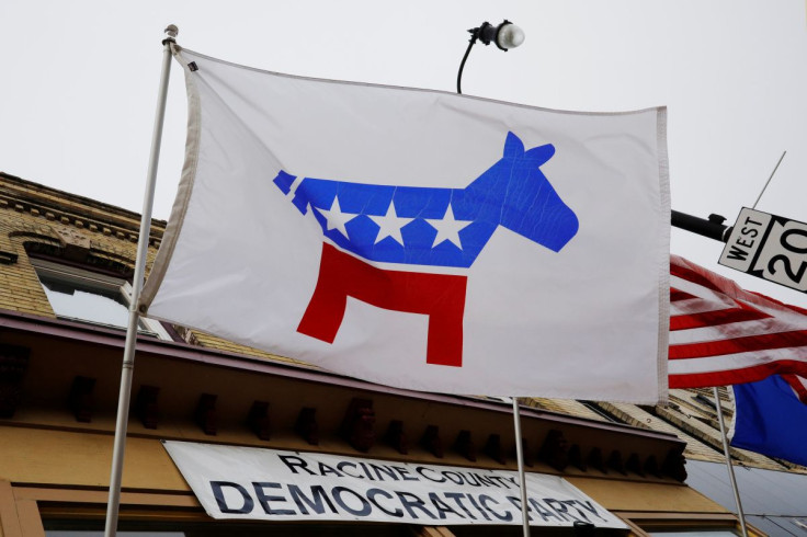 A flag with a logo of the Democratic Party flies over the office of the Racine County Democratic Party in Racine, Wisconsin, U.S., April 27, 2019.  