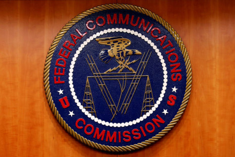 The Federal Communications Commission (FCC) logo is seen before the FCC Net Neutrality hearing in Washington February 26, 2015. 