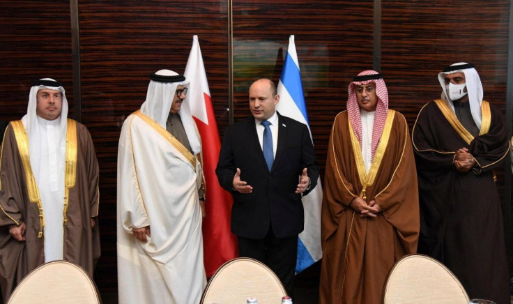 Israeli Prime Minister Naftali Bennett meets with Bahrain's Foreign Minister Abdullatif Al-Zayani and other officials in Manama, Bahrain, February 15, 2022. Haim Zach/Government Press Office (GPO)/via REUTERS.