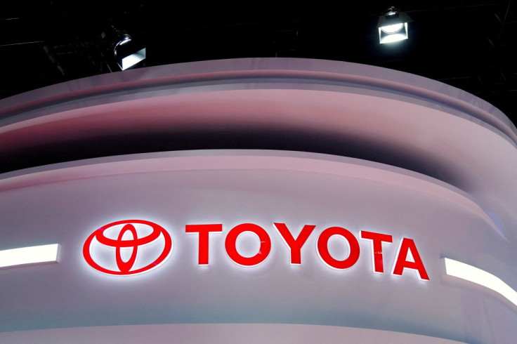 The Toyota logo is seen at a booth during a media day for the Auto Shanghai show in Shanghai, China, April 19, 2021. 