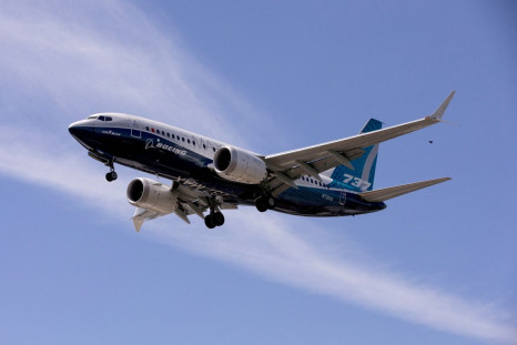 A Boeing 737 MAX airplane lands after a test flight at Boeing Field in Seattle, Washington, U.S. June 29, 2020. 