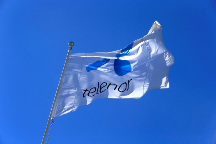 Telenor flag flutters next to the company's headquarters in Fornebu, Norway, June 1, 2017. 