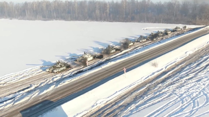 Russian tanks of the Western Military District units return to their permanent deployment sites, in an unknown location in Russia, in this still image taken from a handout video released February 15, 2022. Russian Defence Ministry/Handout via REUTERS