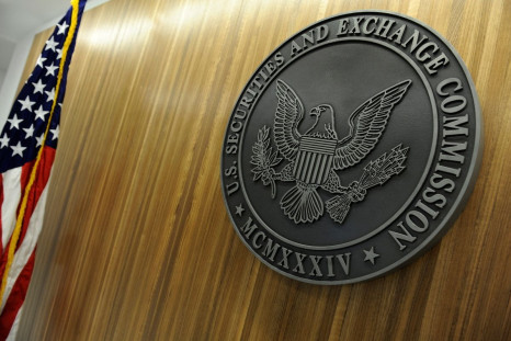 The seal of the U.S. Securities and Exchange Commission hangs on the wall at SEC headquarters in Washington, June 24, 2011. 