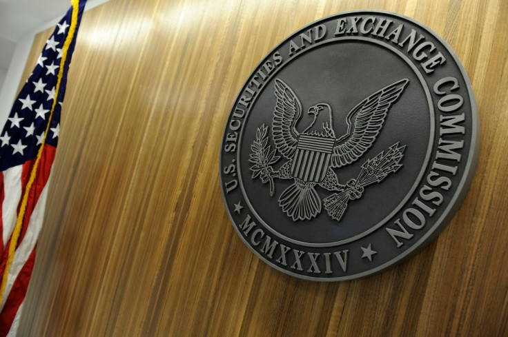 The seal of the U.S. Securities and Exchange Commission hangs on the wall at SEC headquarters in Washington, June 24, 2011. 