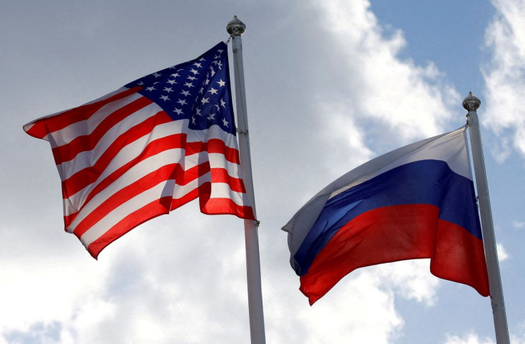 Russian and U.S. state flags fly near a factory in Vsevolozhsk, Leningrad Region, Russia March 27, 2019.