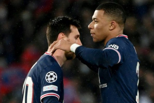 Kylian Mbappe with Lionel Messi, who had a second-half penalty saved by Real Madrid goalkeeper Thibaut Courtois