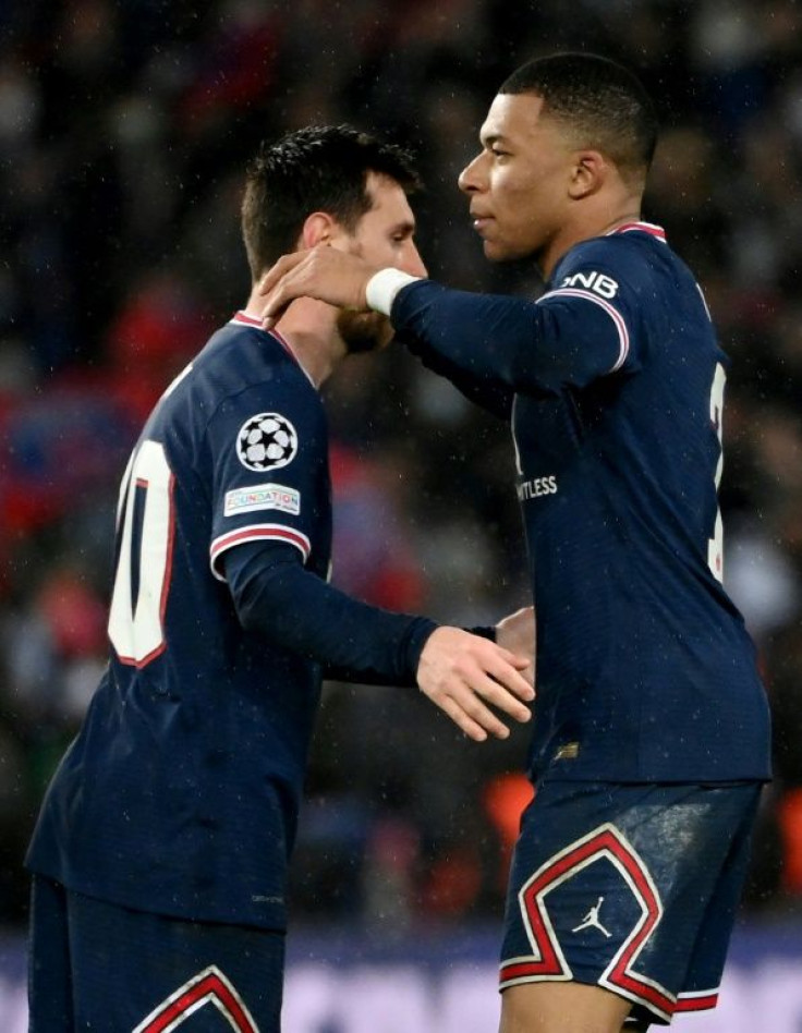 Kylian Mbappe with Lionel Messi, who had a second-half penalty saved by Real Madrid goalkeeper Thibaut Courtois