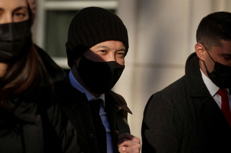 Ex-Goldman Sachs banker Roger Ng exits after the first day of his criminal trial, at the United States Courthouse in Brooklyn, New York, U.S., February 14, 2022. 