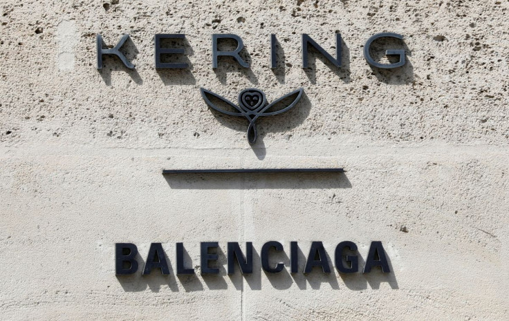 The logos of French luxury group Kering and fashion house Balenciaga are pictured on Kering headquarters in Paris, France, April 20, 2020.