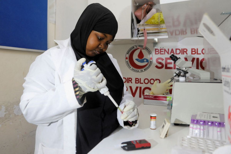 Somali nurse Fatima Hassan screens a blood sample at the Benadir Blood Service, in Mogadishu, Somalia February 7, 2022.