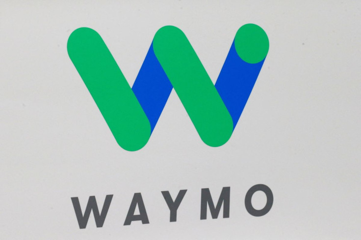 The Waymo logo is displayed during the company's unveil of a self-driving Chrysler Pacifica minivan during the North American International Auto Show in Detroit, Michigan, U.S., January 8, 2017.  