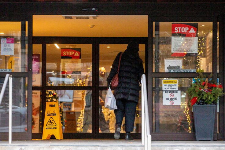 A person enters Copernicus Lodge after new provincial rules limiting visitations at long-term care homes come into effect due to spiking coronavirus disease (COVID-19) case numbers in Toronto, Ontario, Canada December 30, 2021.
