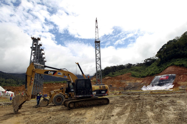 Heavy duty equipment is seen during a ceremony marking the start of construction of a mine owned by Chinese mining company EcuaCorriente in el Pangui, Ecuador December 21, 2015.
