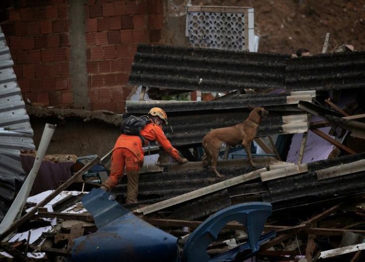 Rescue crews search for survivors in the rubble left by landslides and flooding caused by torrential rains in Petropolis, Brazil Febrary 16, 2022