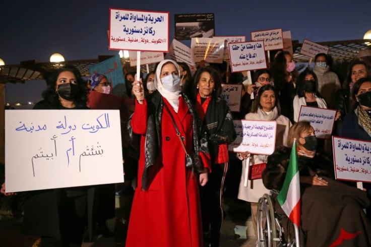 Women activists rally in support of their right to exercise activities, outside the National Assembly in Kuwait City, on February 7, 2022