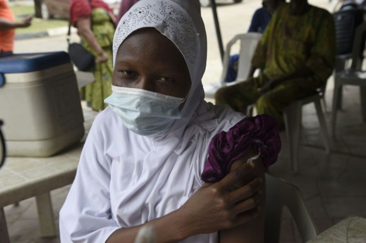 A woman gets her Covid-19 jab at the Secretariat Community Central Mosque, Alausa, Ikeja in Lagos