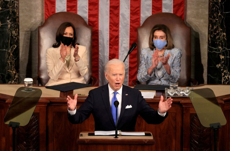 U.S. President Joe Biden addresses a joint session of Congress as Vice President Kamala Harris and Speaker of the House U.S. Rep. Nancy Pelosi (D-CA) applaud, at the U.S. Capitol in Washington, DC, U.S. April 28, 2021. Chip Somodevilla/Pool via 