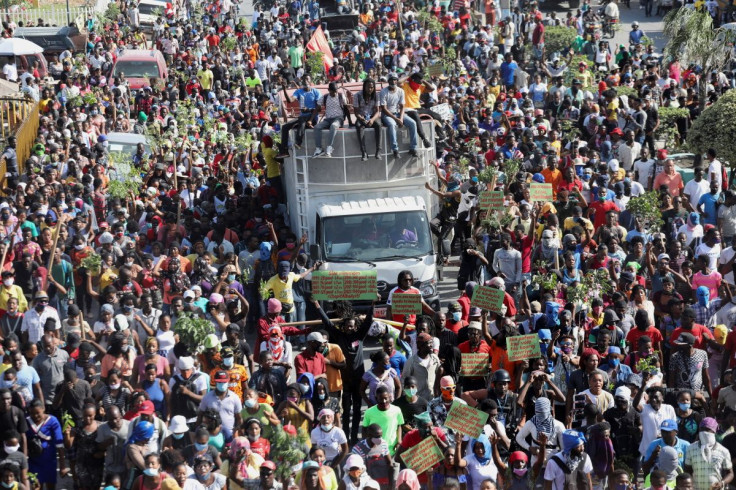 Haitians protest along the streets against their country's unstable economic, political and social situation in Port-au-Prince, Haiti, February 17, 2022.