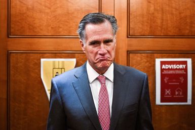 U.S. Senator Mitt Romney (R-UT) reacts to a reporter's question at the U.S. Capitol in Washington, D.C., U.S., February 17, 2022. 