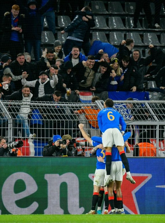 Rangers celebrate their third goal in Dortmund
