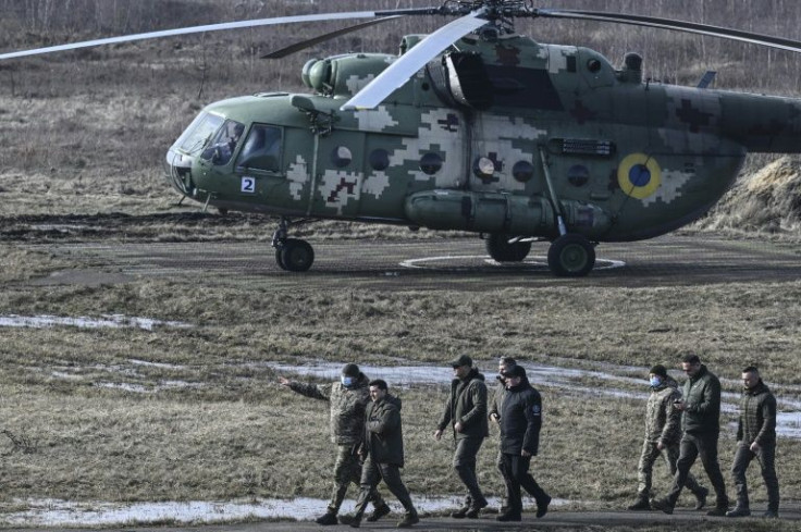 Ukrainian President Volodymyr Zelensky attends a military drill outside the city of Rivne, northern Ukraine