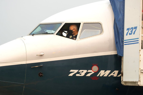 Federal Aviation Administration (FAA) Chief Steve Dickson, sitting inside the flight deck of a Boeing 737 MAX aircraft, conducts a pre-flight check ahead of an evaluation flight from Boeing Field in Seattle, Washington, U.S. September 30, 2020. Mike Siege