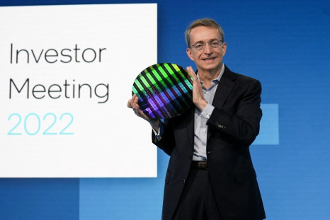 Intel CEO Pat Gelsinger holds a wafer as he speaks on stage at Intel's Investor Day, in San Francisco, California, U.S., February 17, 2022. Intel Corporation/Handout via REUTERS
