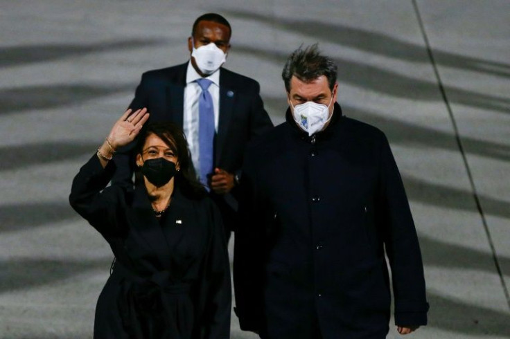 US Vice President Kamala Harris (L) arrives at the airport in Germany, where she will attend the Munich Security Conference