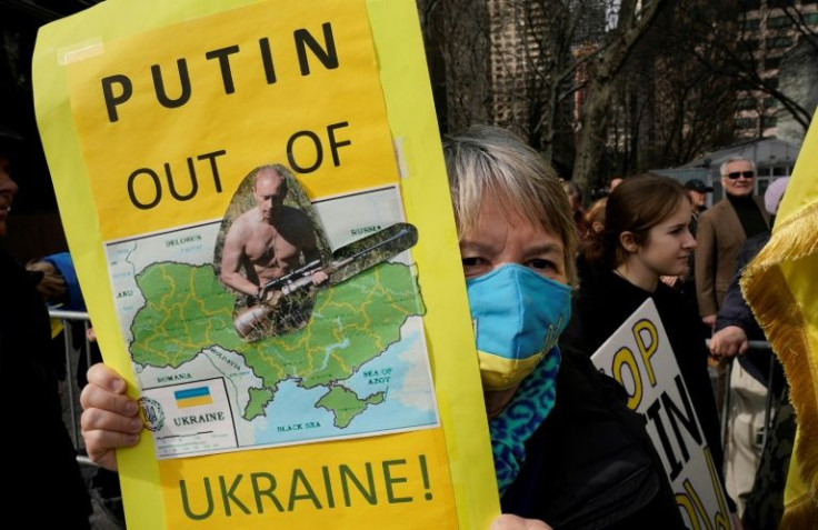 Protesters rally in a show of solidarity with Ukraine outside the United Nations in New York