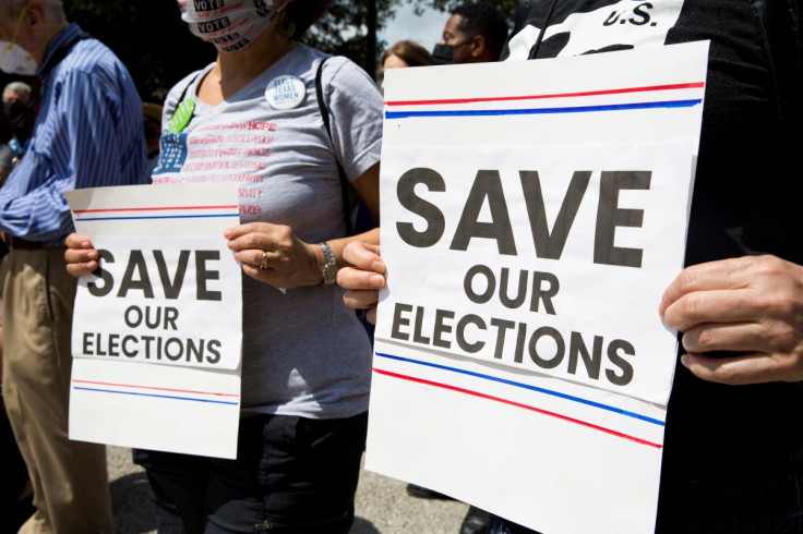 Protesters show support for voting rights during a rally against Texas legislators who are advancing a slew of new voting restrictions in Austin, Texas, U.S., May 8, 2021.  