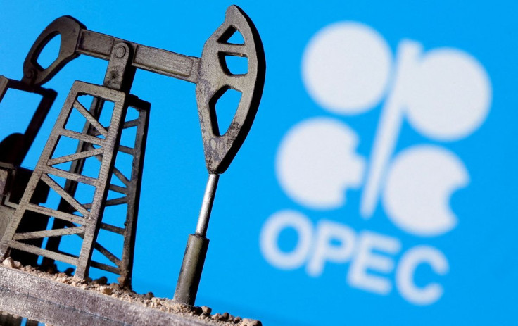 A 3D printed oil pump jack is seen in front of displayed OPEC logo in this illustration picture, April 14, 2020. 