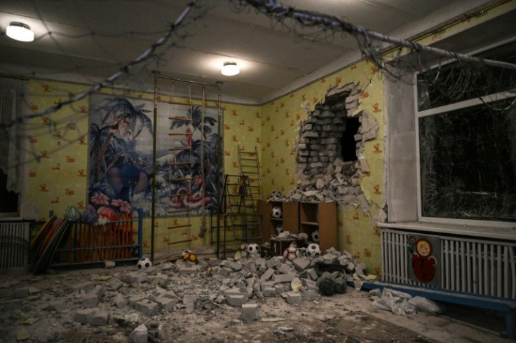 A shell blew a hole in the walll of a kindergarten in east Ukraine, frightening children and escalating fears of an escalation that could provoke a Russian invasion