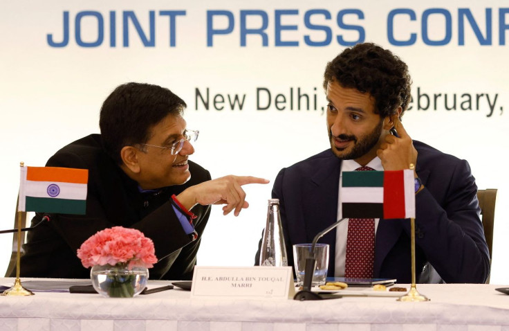 India's Minister of Commerce and Industry, Piyush Goyal talks to Abdulla Bin Touq Al Marri, Minister of Economy of the United Arab Emirates, (UAE), during their joint news conference in New Delhi, India, February 18, 2022. 