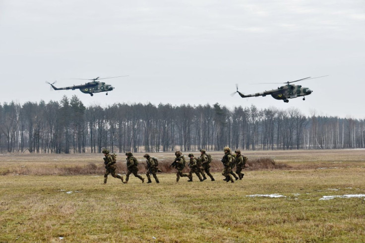 Service members of the Ukrainian Air Assault Forces take part in tactical drills at a training ground in an unknown location in Ukraine, in this handout picture released February 18, 2022. Press Service of the Ukrainian Air Assault Forces/Handout via REUT
