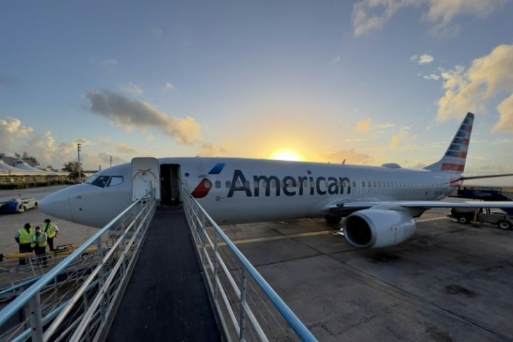 American Airlines will cut flights to a variety of international destinations because of delivery delays with the Boeing 787 Dreamliner