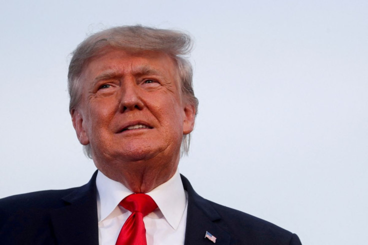 Former U.S. President Donald Trump looks on during his first post-presidency campaign rally at the Lorain County Fairgrounds in Wellington, Ohio, U.S., June 26, 2021. 